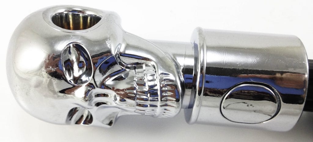 Oliphant Skull Umbrella Image shows the open/close button.