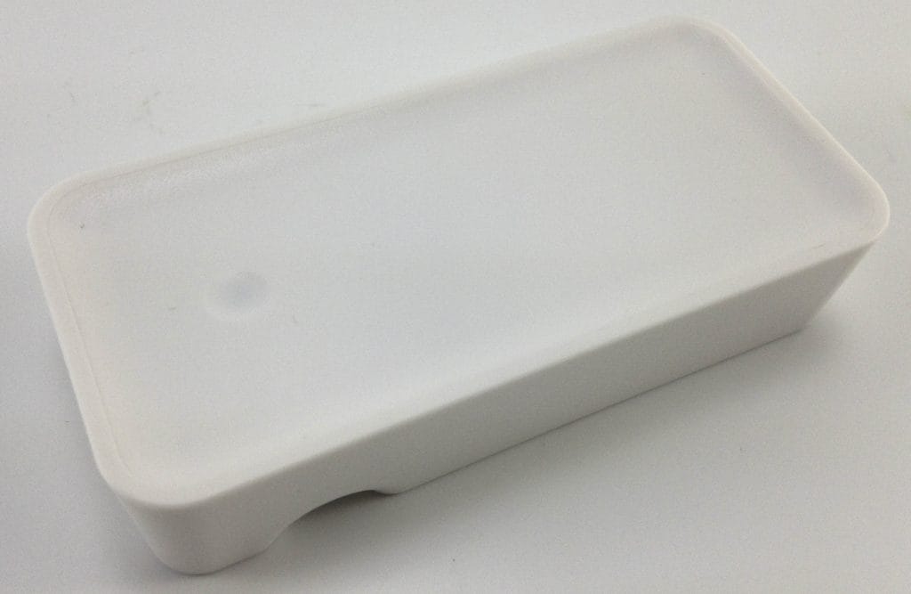 Image shows the outdoor sensor. It's white in colour.