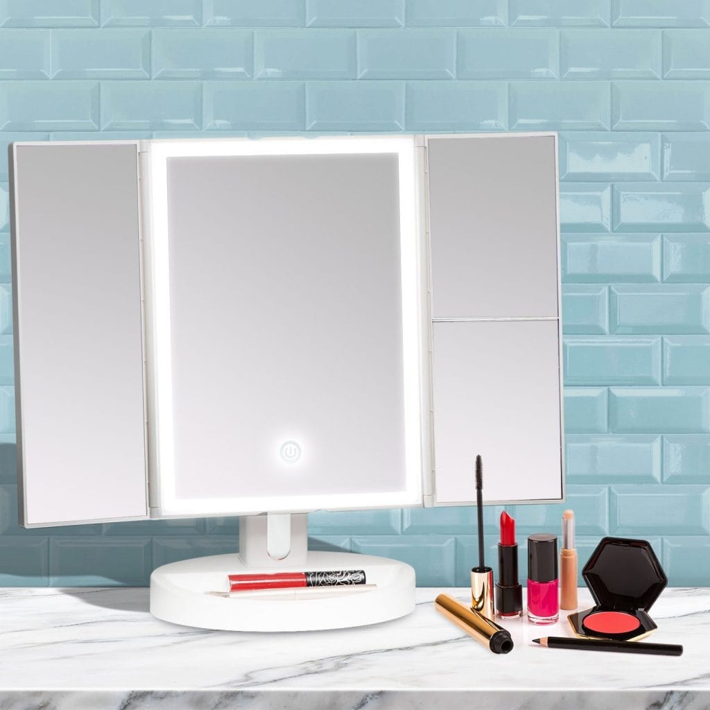 Image shows the mirror with makeup on it.