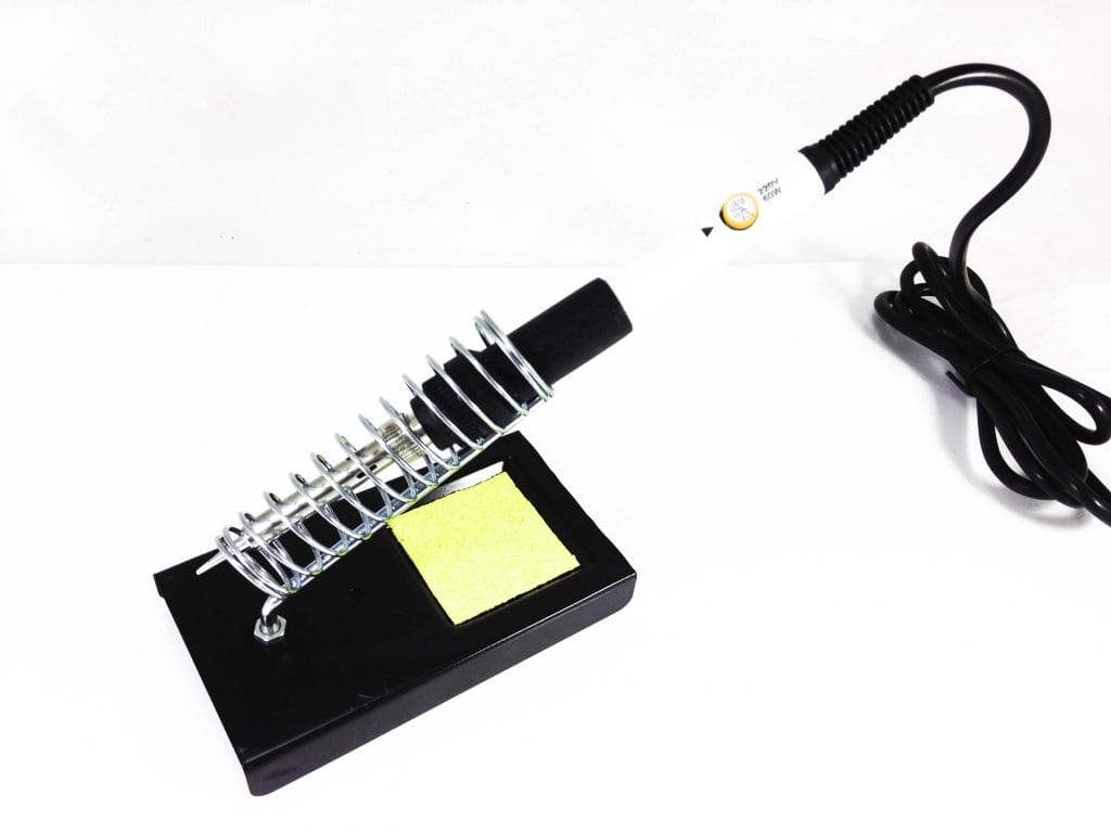 Image shows the soldering iron in a stand.