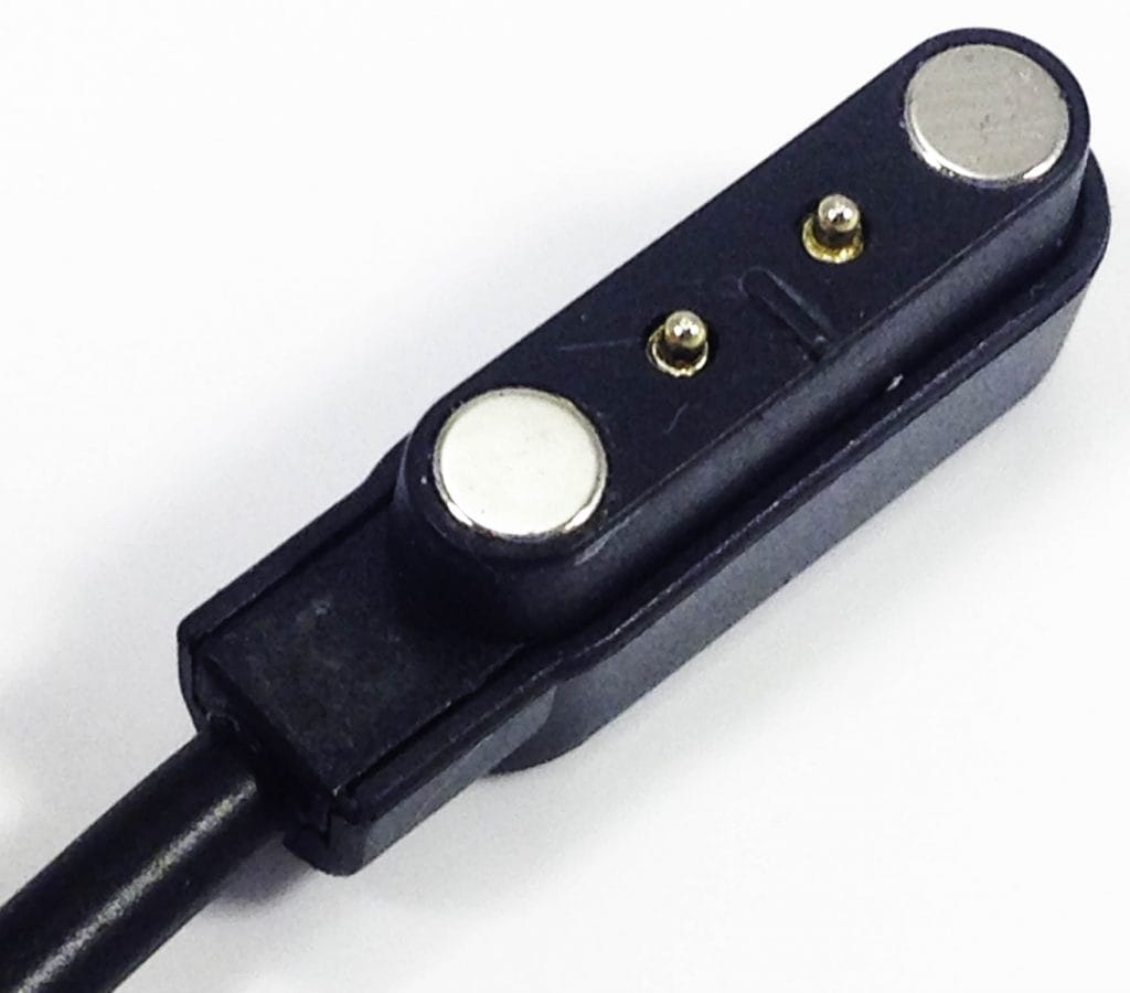 Torus Pro N69 Fitness Tracker Image shows the charger port to the Torus Pro N69 Fitness Tracker.