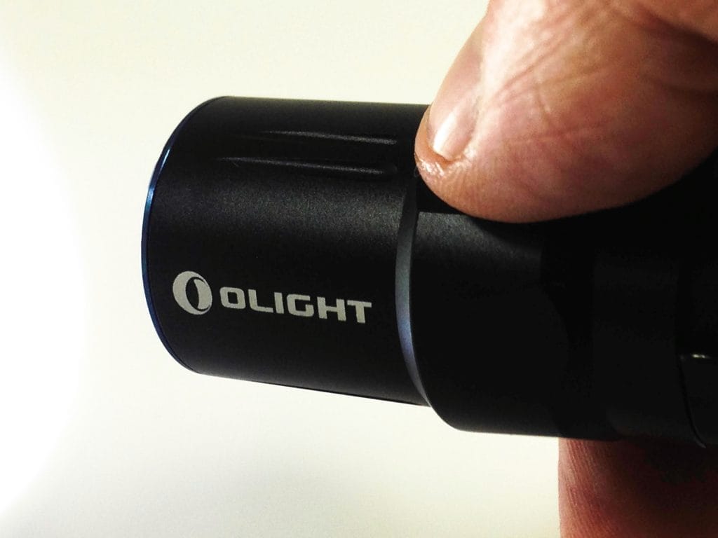 Olight M2T Warrior Flashlight Image of the flashlight on.