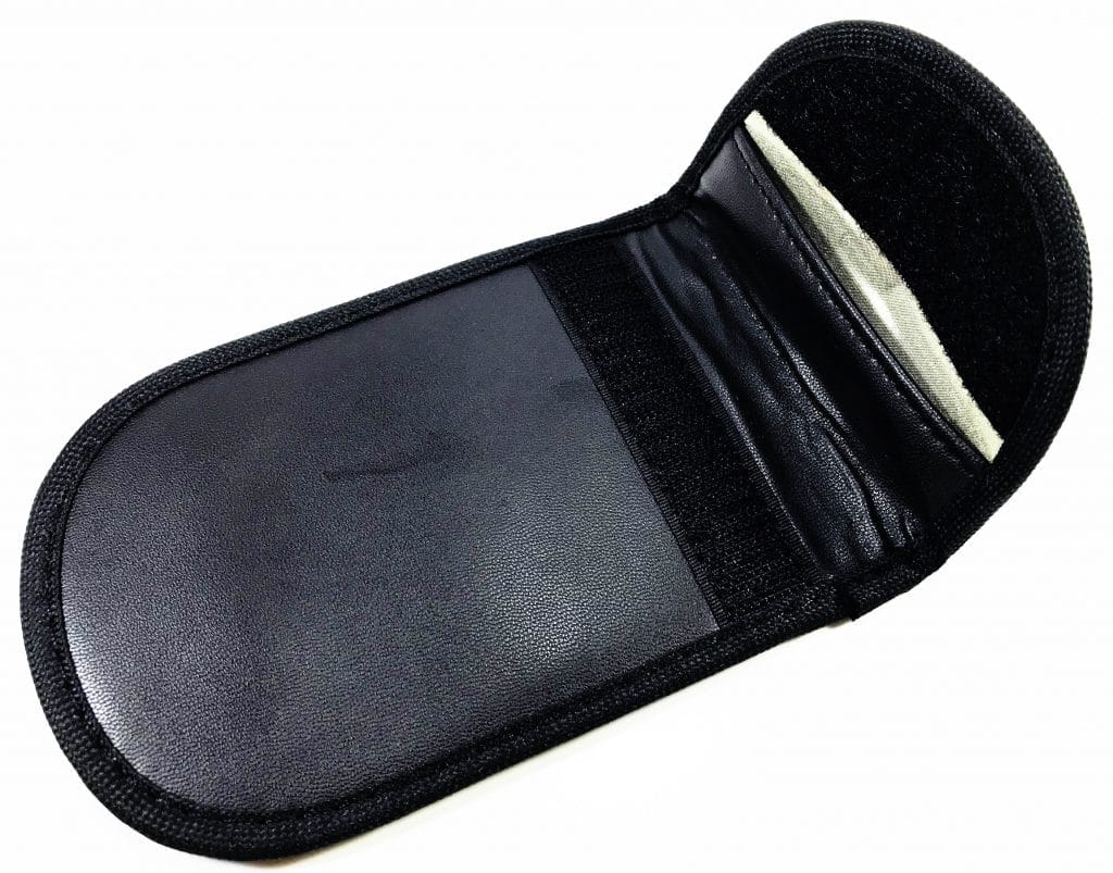 KeyJail Car Key Signal Blocker Image shows one of the KeyJail Car Key Signal Blocker open to show the internal fabric