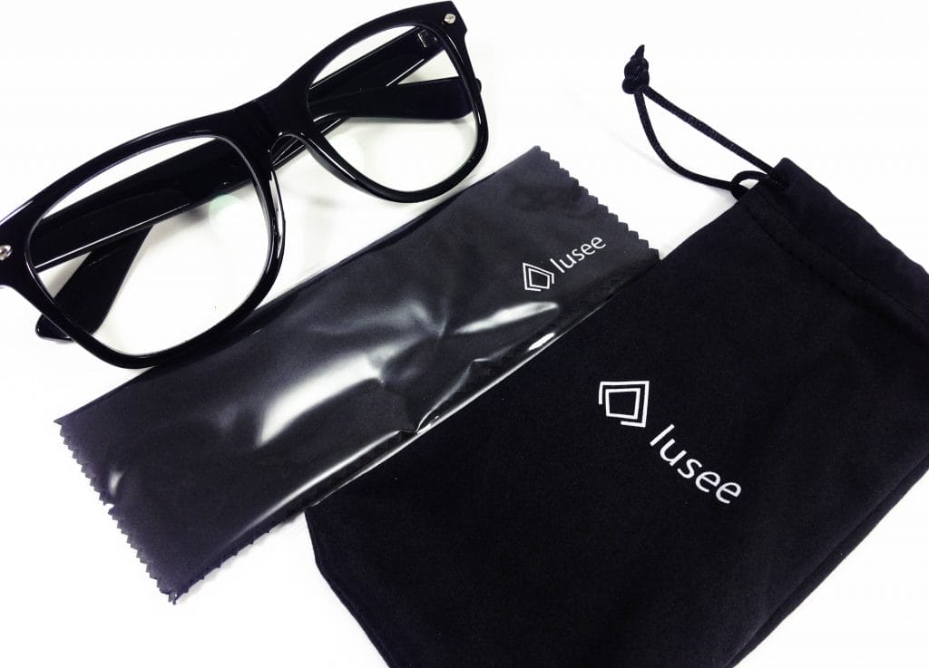 Lusee Gaming Glasses Image shows the included contents in a laid out position