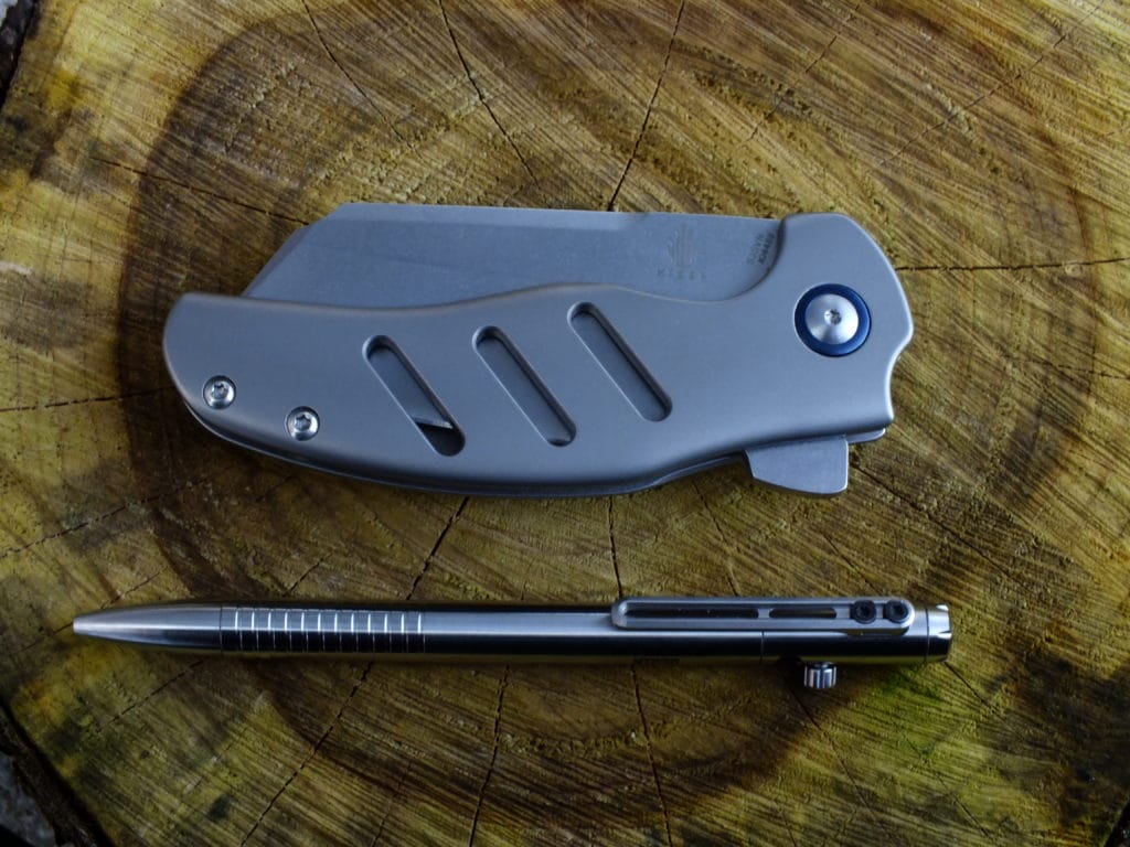 The Nitecore NTP30 and Kizer Sheepdog for size reference