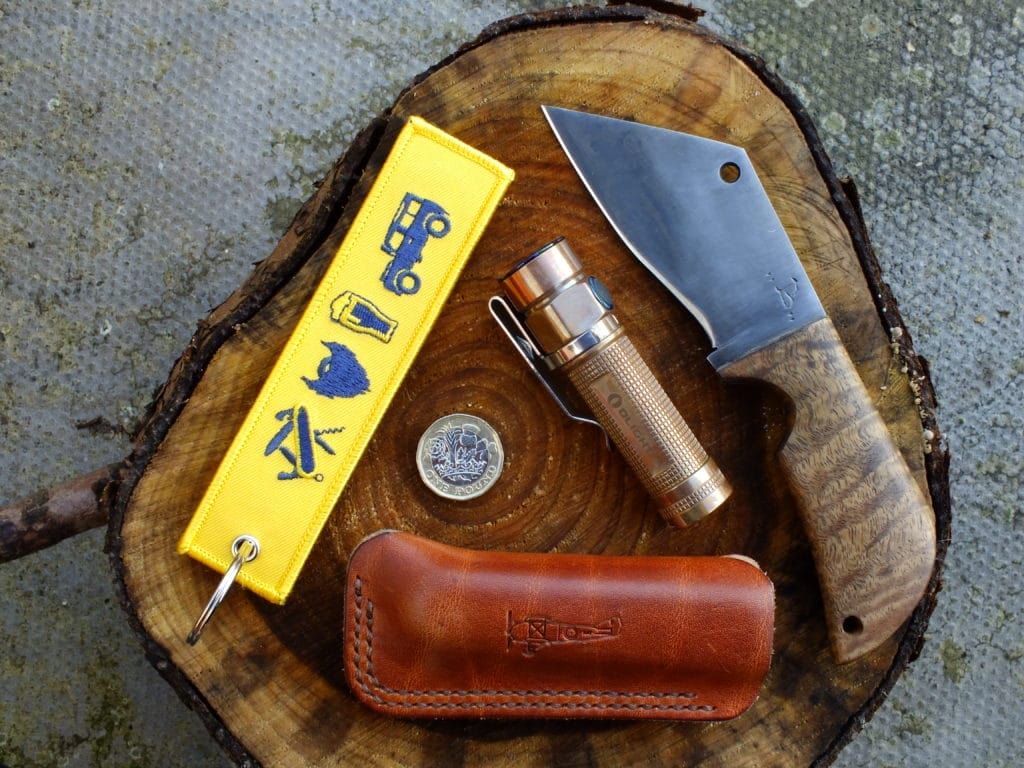 A photo for size reference of the Olight S1A Baton