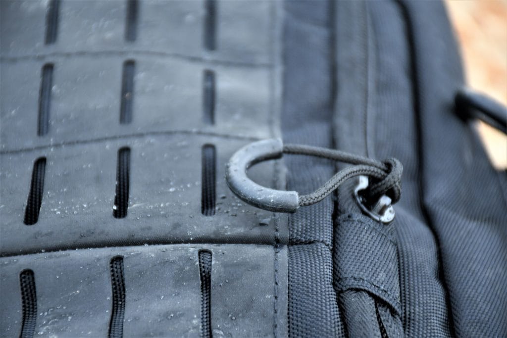 The NEB10 uses D-ring zip pulls, which are easy to use when wearing gloves