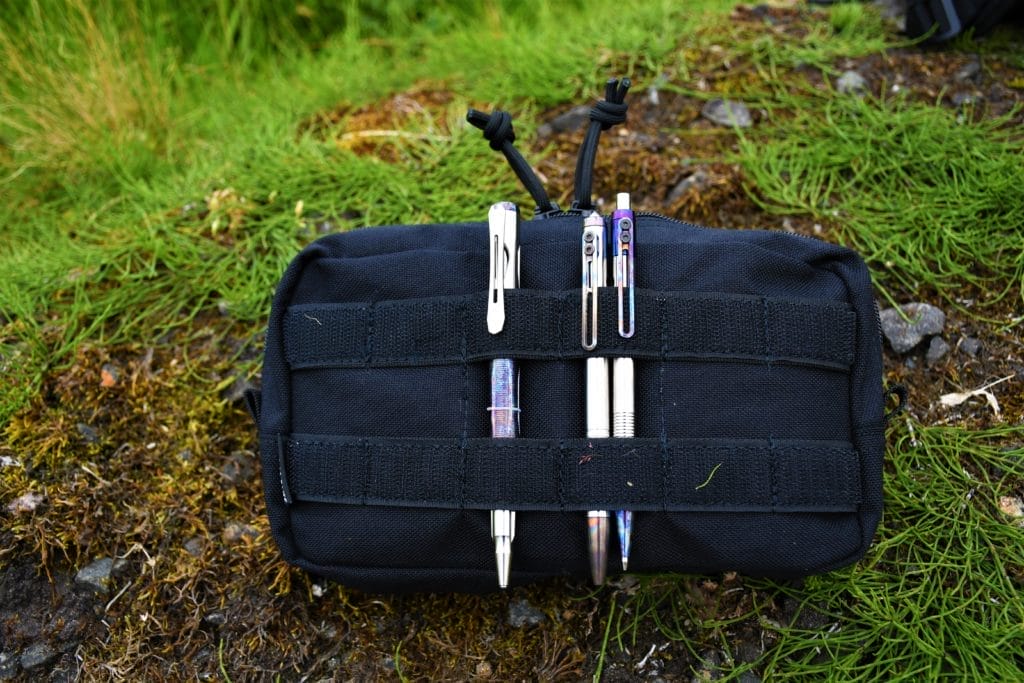 A photo of some Nitecore pens and pencils tucked into the back