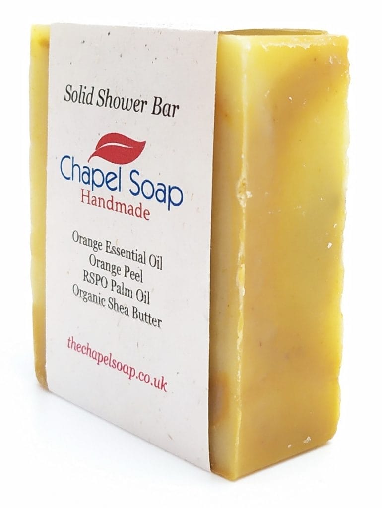 A Chapel Soap bar of Orange soap displayed at an angle.