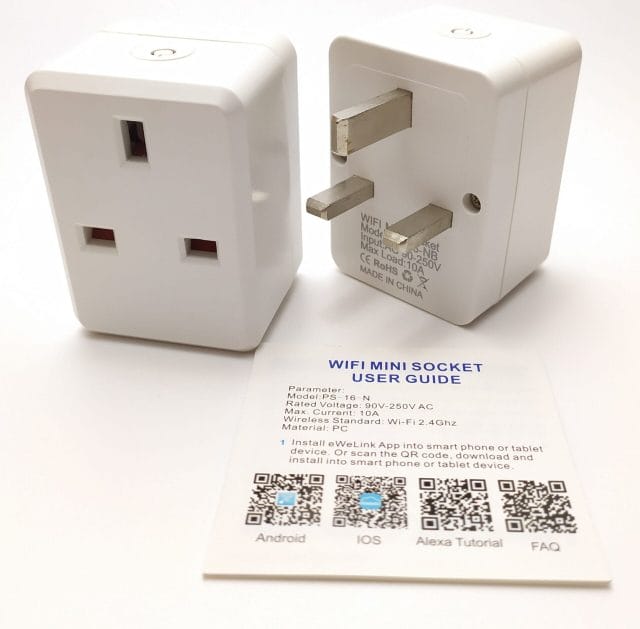 Image shows two smart plugs and the paper user guide.