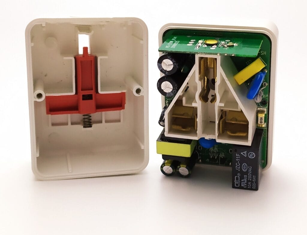 Image shows the cover removed from the plug.