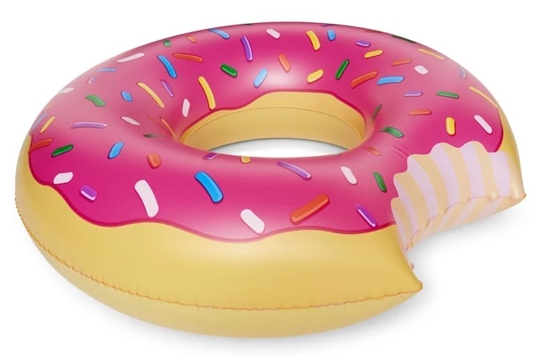 Image shows an inflated doughnut shaped pool float displaying the bite mark design.