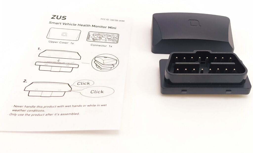 Image shows the instruction sheet with the vehicle monitor to the right.