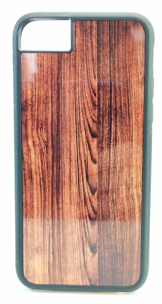 Image shows a Casemill phone case with a wooden effect pattern.