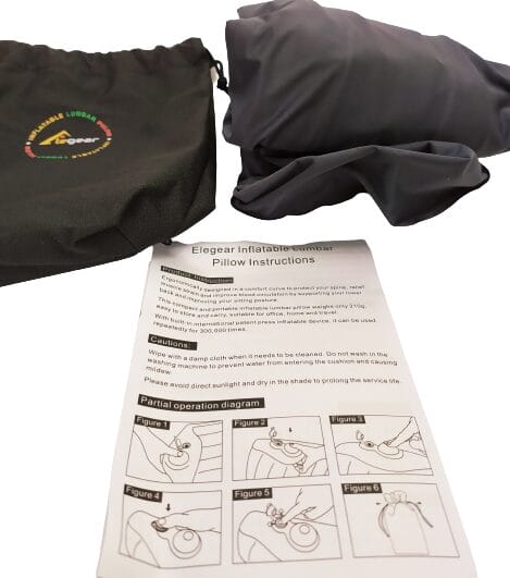 Image shows the lumbar cushion, carry bag, and user guide.