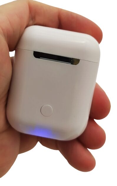 Image shows the charging case in my left hand.