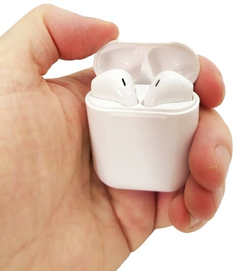 Image shows the charging box with the open lid in my left hand.