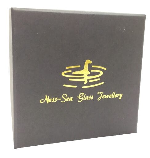 Image shows a black giftbox. The Ness-Sea Glass logo is in gold.