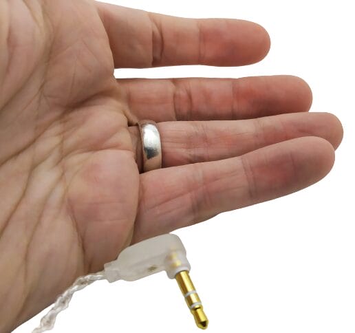 Image shows the jack plug resting against my left hand.