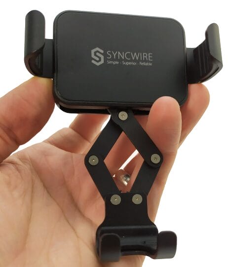 Image show me holding the car mount exposing the cantilever mechanism. 