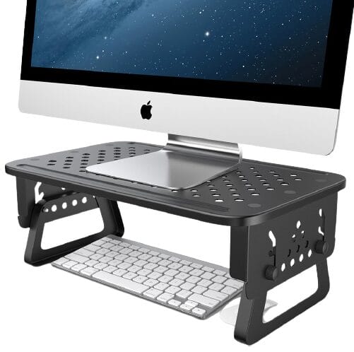 Image shows an Apple PC on the stand. Underneath there is a wireless keyboard and mouse.