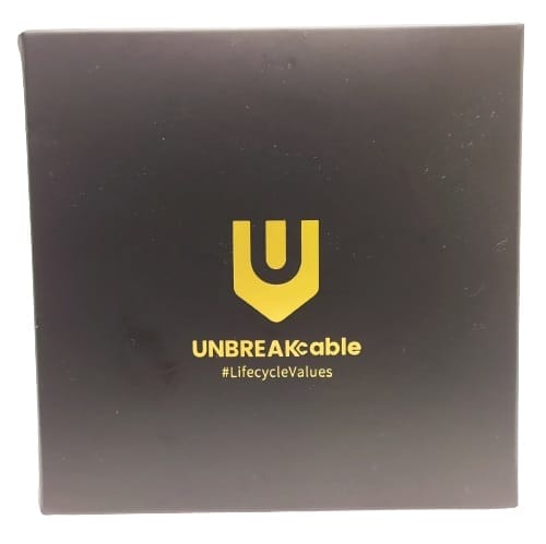 Image shows the outer packaging. The box is black with gold logo.