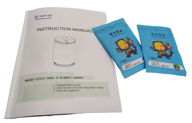 Image shows the user guide and the sachets. 