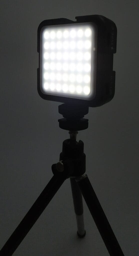Image shows the light on the tripod, the light is powered on.