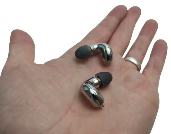 Image shows the earphones in the palm of my left hand.