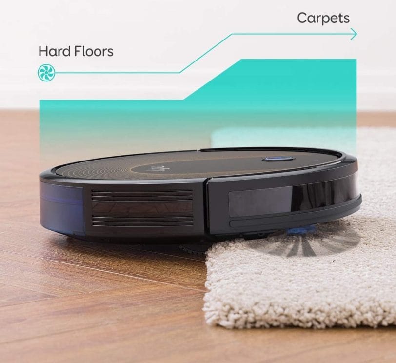 Image shows the vacuum cleaner cleaning a rug.