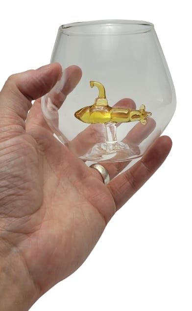 Image shows my holding the Submarine in a Glass.