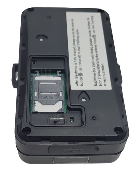 Image shows the SIM card and power switch of the tracker.