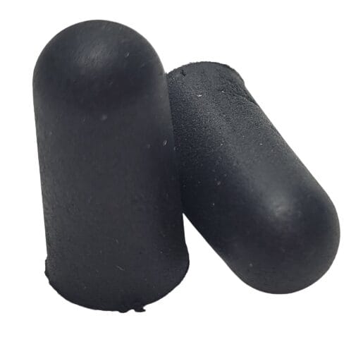 Image shows two black earplugs, one standing in an upright position, the other laid down to show both ends of the earplugs.