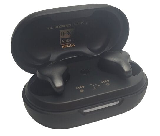 Image shows the earbuds charging in the battery case.