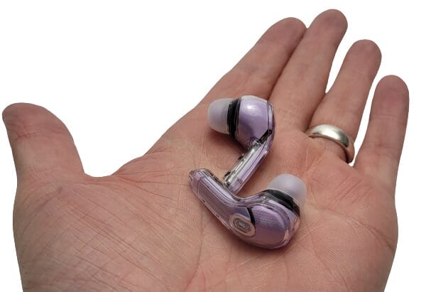 Image shows the earbuds in my left palm.