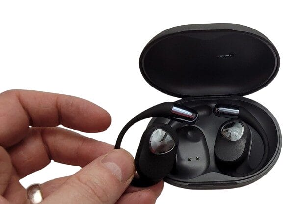 Image shows myself removing the left earbud from the battery case. The right earbud is still in the case.