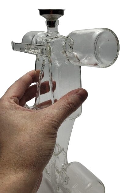 Image shows the decanter with a funnel in the rear area.