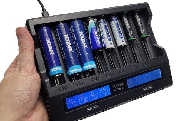 Image shows 8 different batteries being charged.