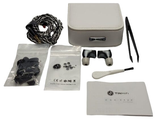 Image shows the included contents of the TINHIFI T5S IEM's in a laid out position.