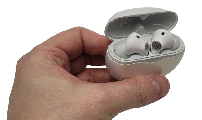 Image shows the battery case open revealing the earbuds. 