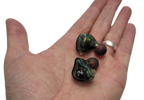 TRN MT1 IEM's Image shows the TRN MT1 IEM's in my left hand.