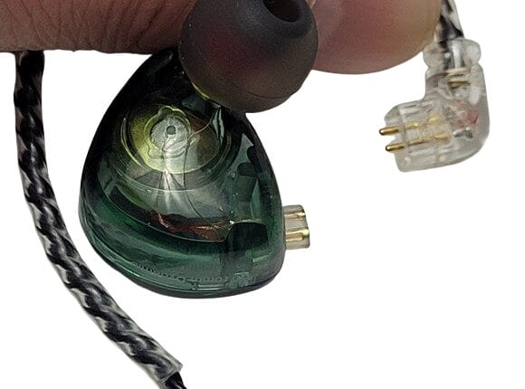 Image shows the cable being removed from the IEM.