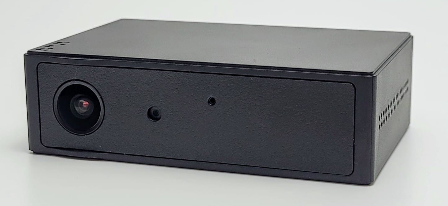 Image shows the Zetta Z82 Spy Camera in a front view, showing both lens and microphone hole.