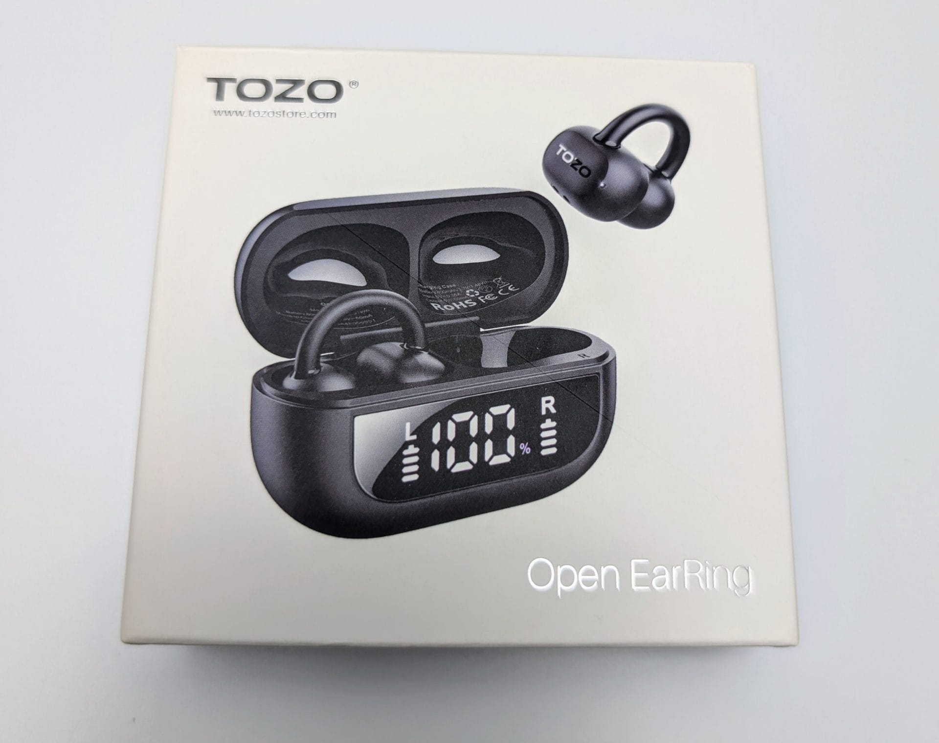 Image shows the outer box for the TOZO Open EarRing earbuds.