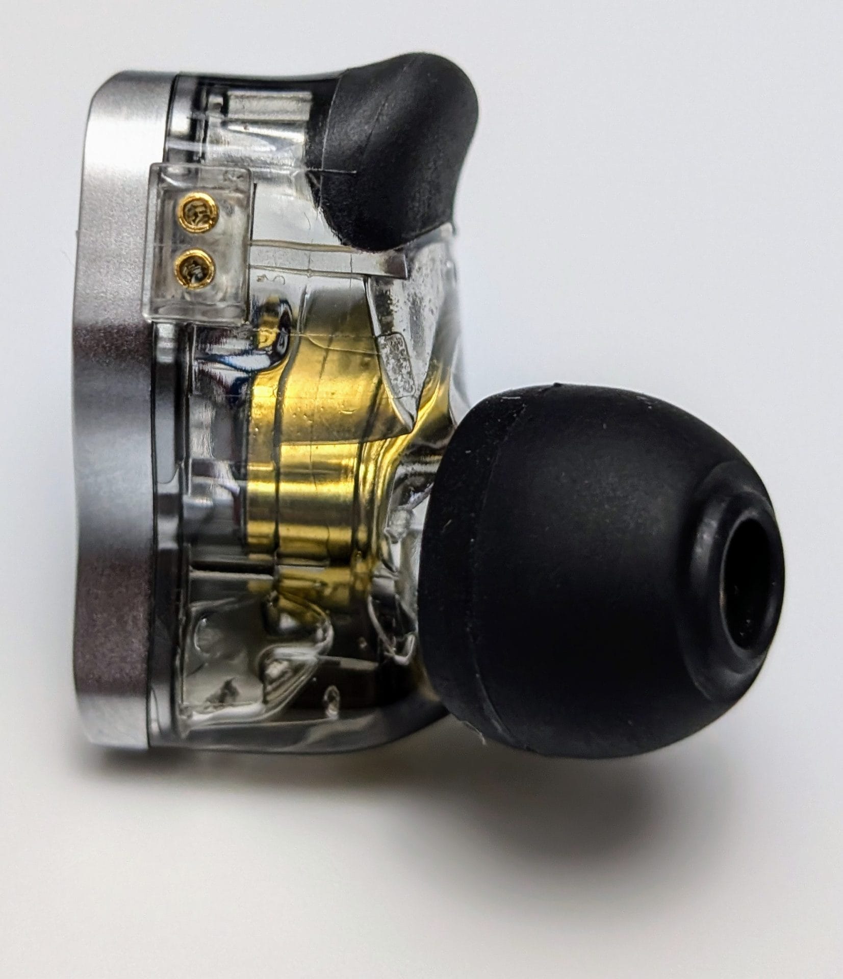 Image shows an IEM as a side view.