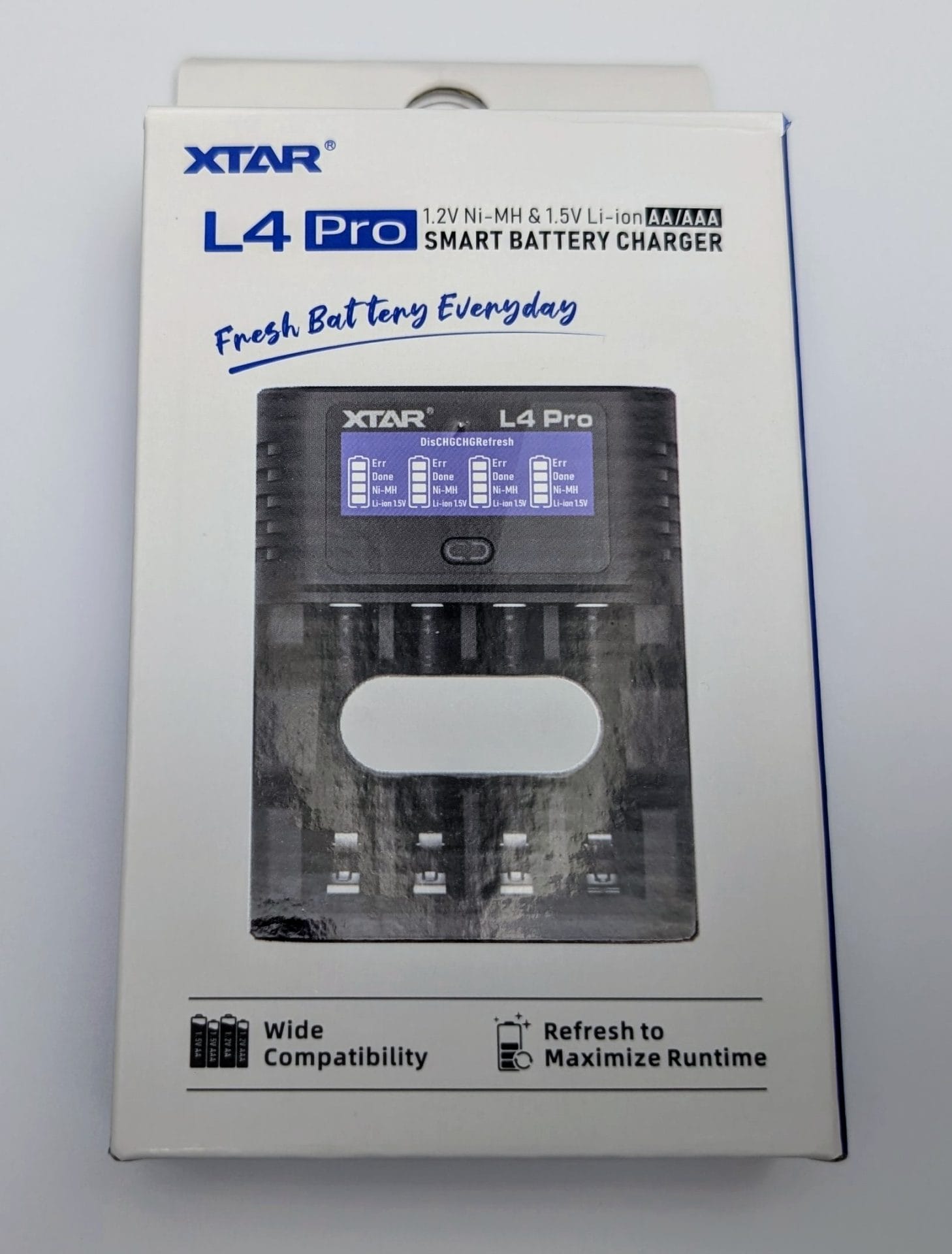 XTAR L4 Pro Battery Charger Box of the XTAR L4 Pro Smart Battery Charger, featuring a black charger with a digital display showing charging status for Ni-MH and Li-ion AA/AAA batteries. The box highlights compatibility with 1.2V Ni-MH and 1.5V Li-ion batteries, wide compatibility, and a refresh function to maximize runtime. The brand logo and model name are prominently displayed on the packaging.