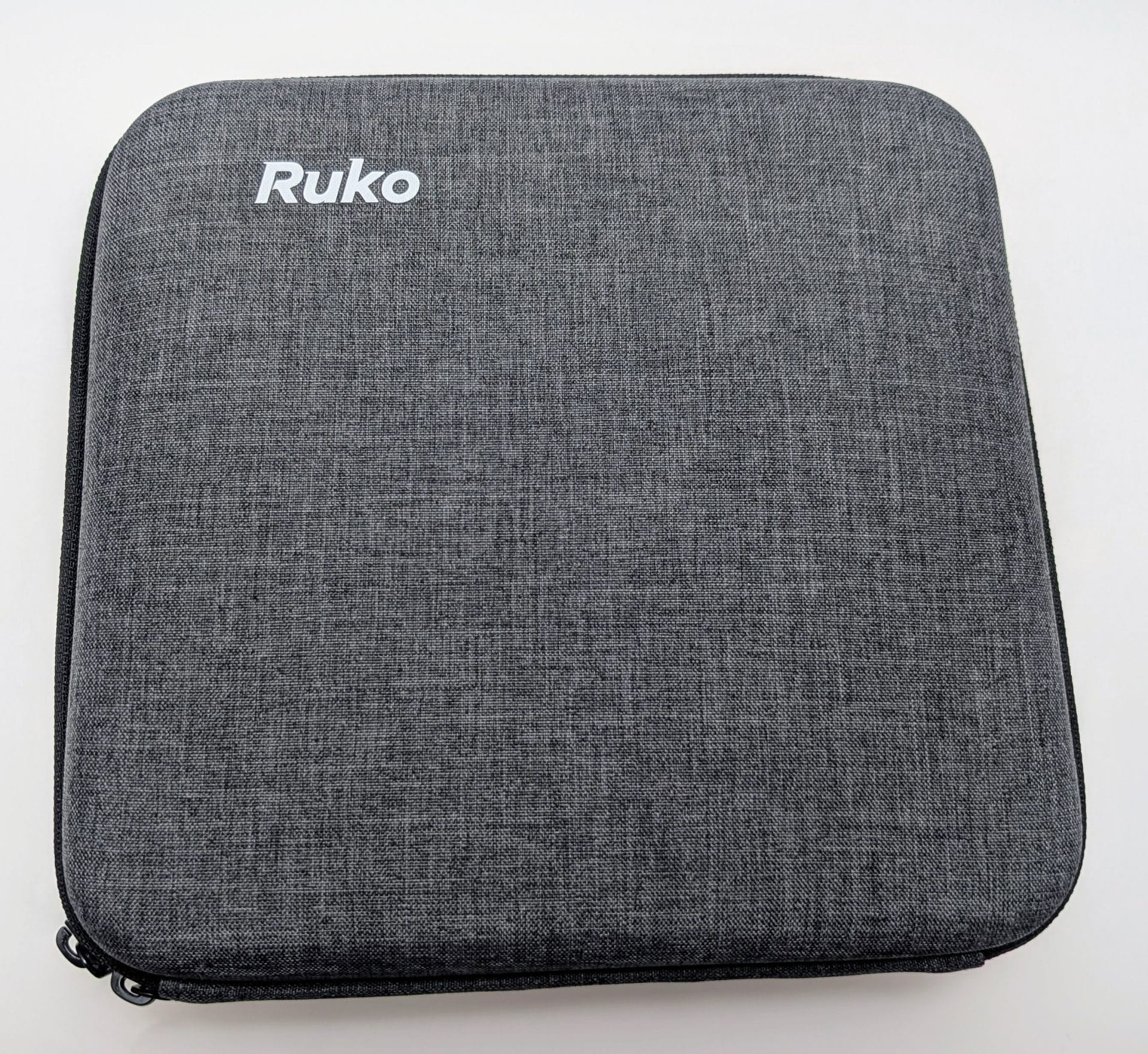 A grey fabric carrying case with the brand name "Ruko" printed in white on the top, designed to store and protect the Ruko U11MINI 4K Drone and its accessories. The case features a zipper closure and a sturdy, padded exterior.